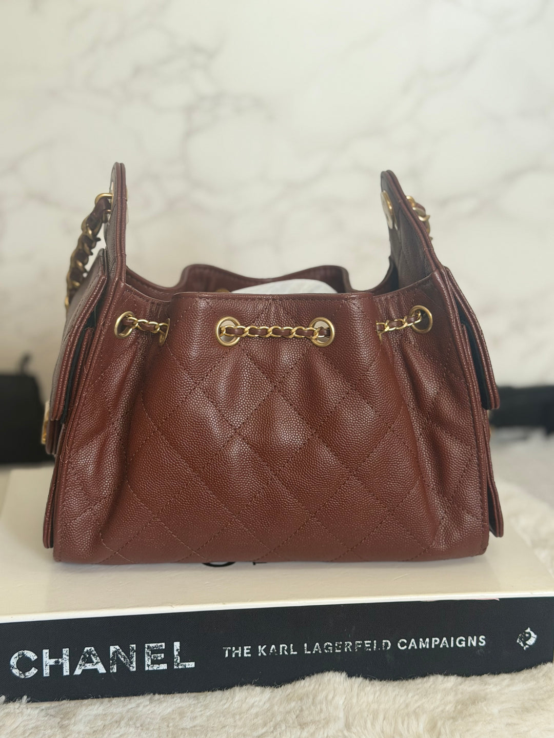 CHANEL 26S Brown Caviar Mini 25 Hobo Bag with Aged GHW 2026