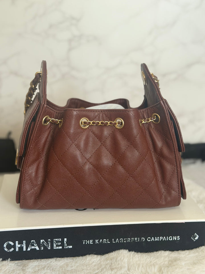 CHANEL 26S Brown Caviar Mini 25 Hobo Bag with Aged GHW 2026