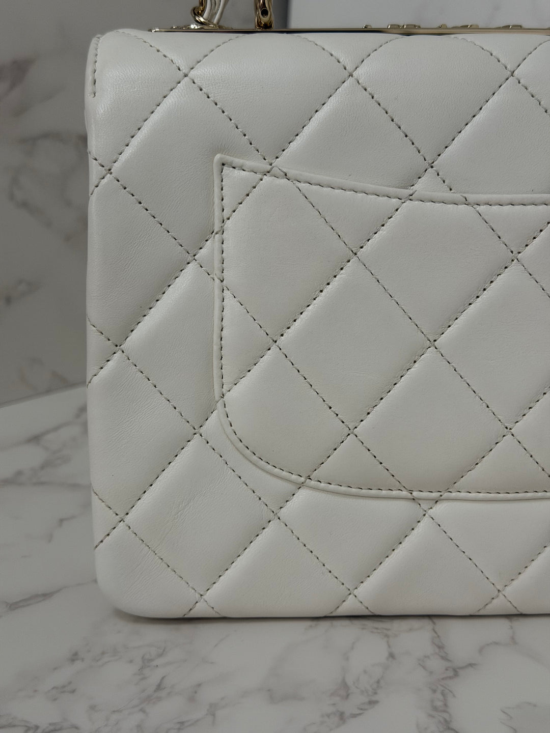 CHANEL 23S collection 2023 White Lambskin LGHW Trendy CC Flap Bag size Small with raised CHANEL Engraved Plate Top Handle