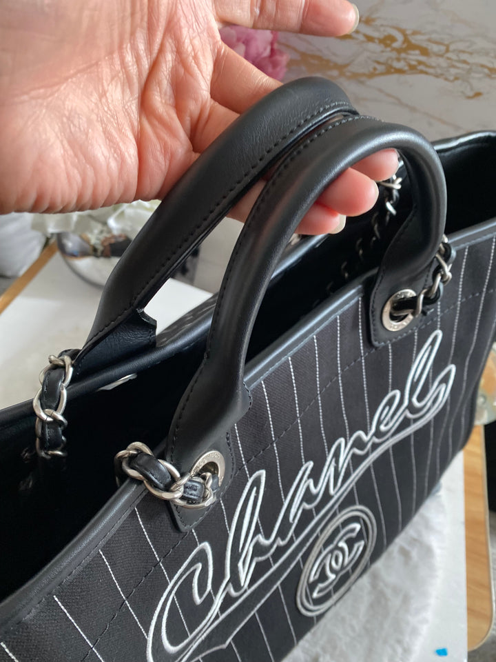 Chanel 23P 2023 collection in Black/White Stripe Canvas Deauville Tote with Top Handle and detachable pouch size Medium (15 inches)
