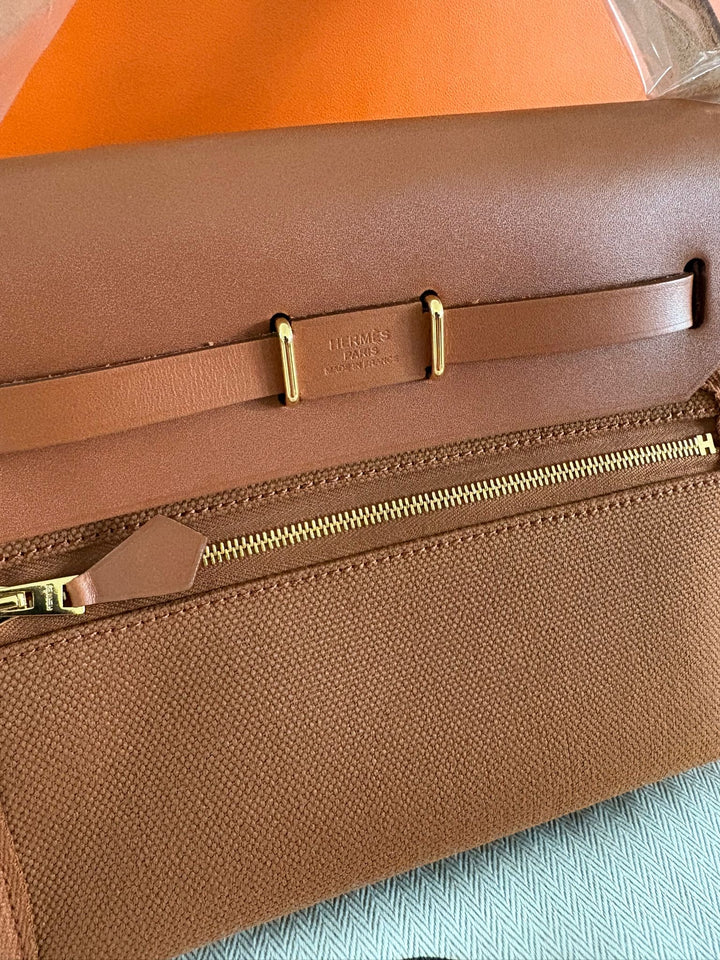 Hermès Gold Vache Hunter and Toile Mini Herbag Zip 20 Gold Hardware, 2026