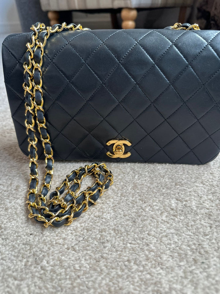 CHANEL series 1 Black Lambskin 24k GHW Full Flap Bag
