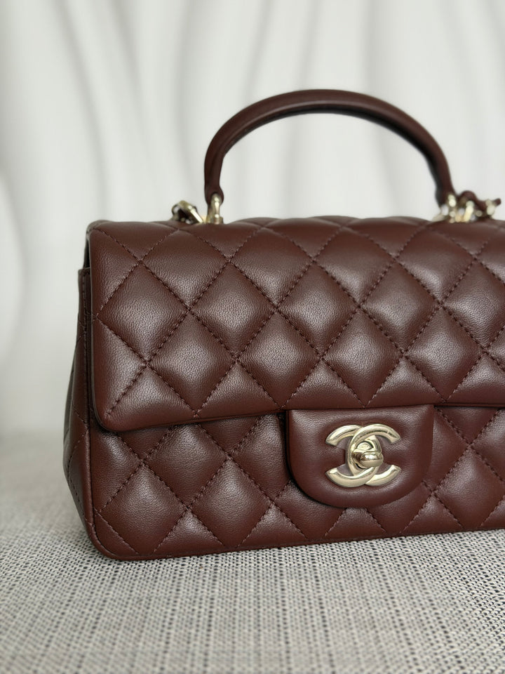 CHANEL 25K collection 2025 Brown Lambskin LGHW Mini Rectangular Flap Bag with Leather Top Handle