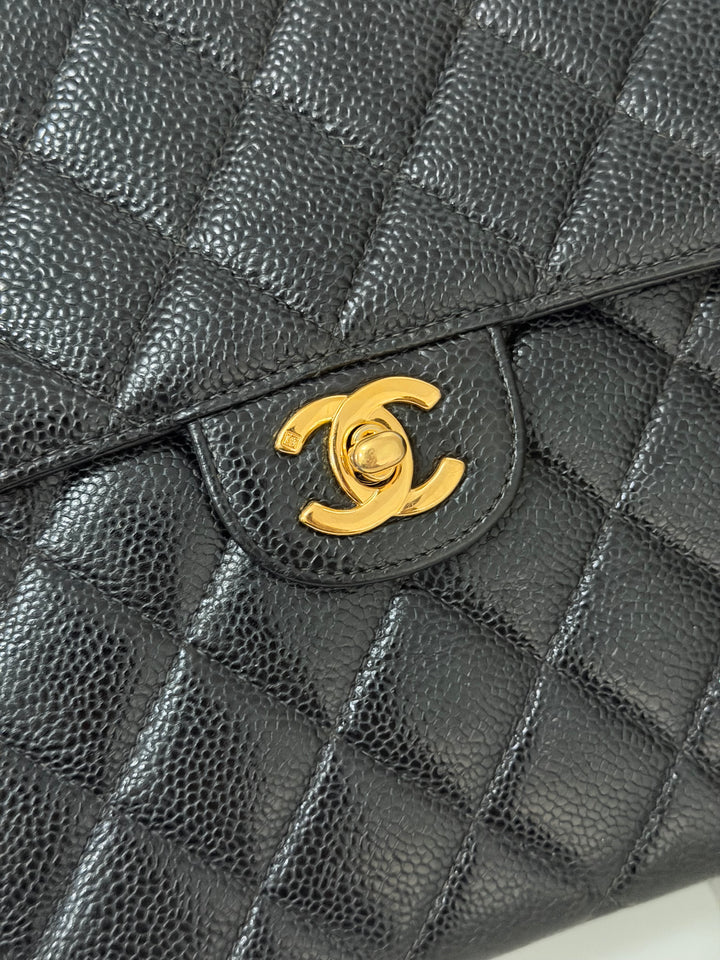 Chanel Series 7 24K GHW Black Caviar Vintage Jumbo Single Flap Bag 2008/2009