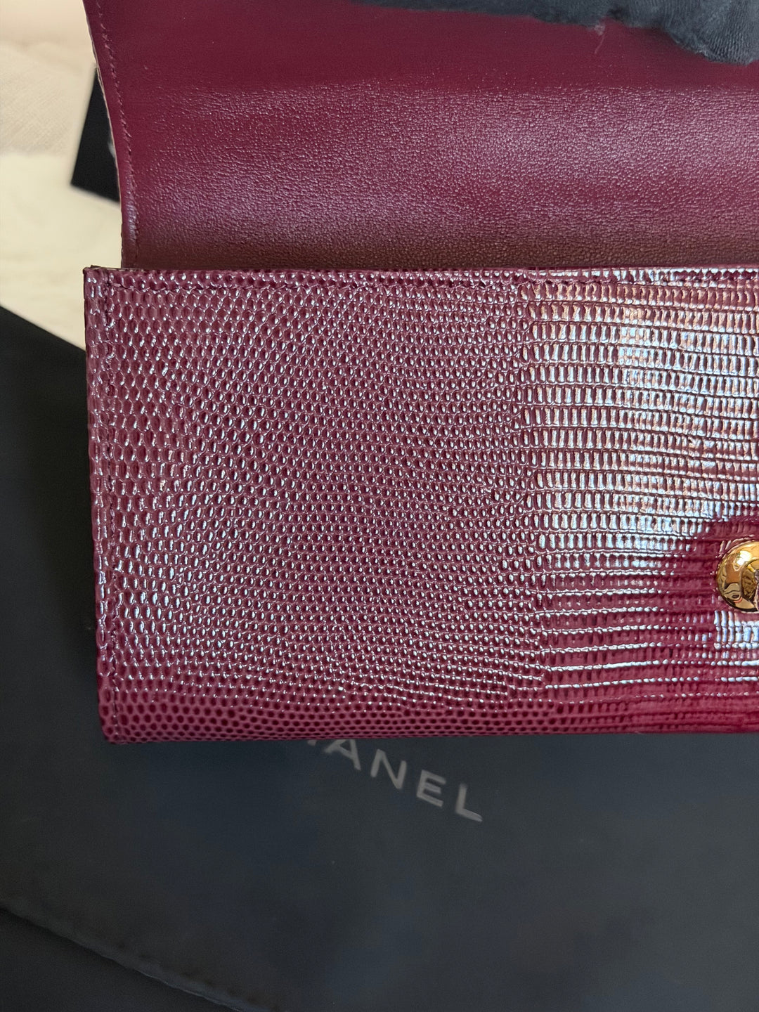 CHANEL 26A Matthieu Blazy Clutch with Top Handle in Burgundy Lizard-Embossed Calfskin with Light Gold Hardware 2026