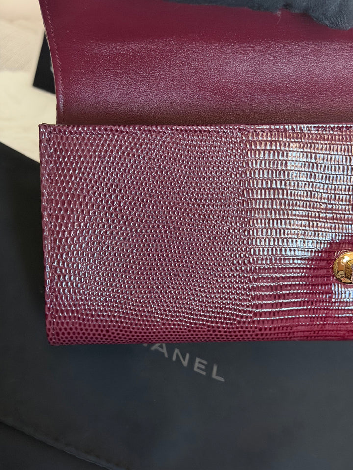 CHANEL 26A Matthieu Blazy Clutch with Top Handle in Burgundy Lizard-Embossed Calfskin with Light Gold Hardware 2026
