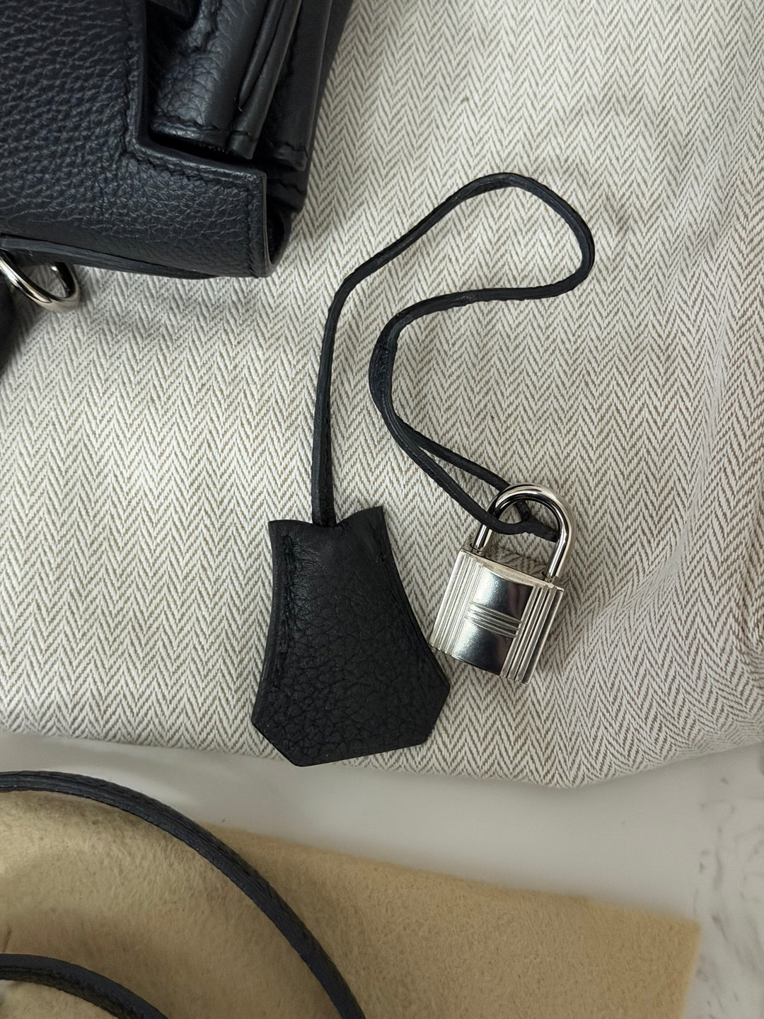 HERMES Noir Black Togo Leather with Palladium Hardware Kelly 28 Retourne Bag Stamp R 2014