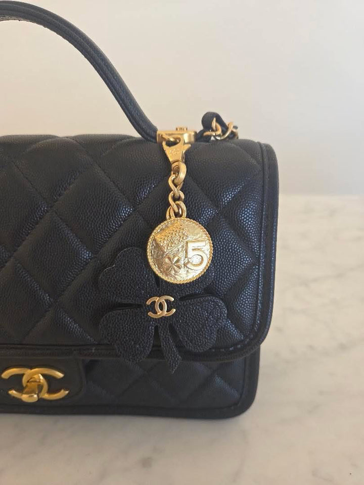 CHANEL 25B 2025 Top Handle Black Caviar Aged GHW with Charm