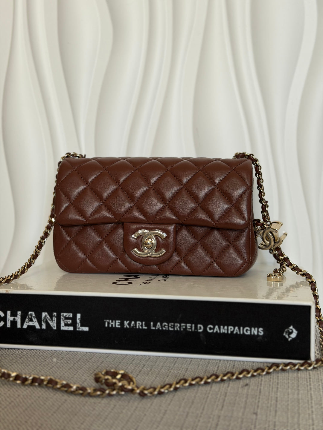 CHANEL 26S Brown Lambskin Adjustable Chain LGHW Mini Rectangular Flap Bag 2026