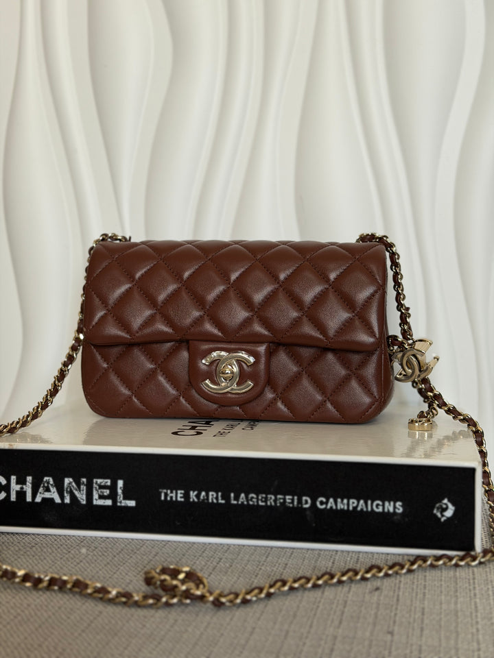 CHANEL 26S Brown Lambskin Adjustable Chain LGHW Mini Rectangular Flap Bag 2026