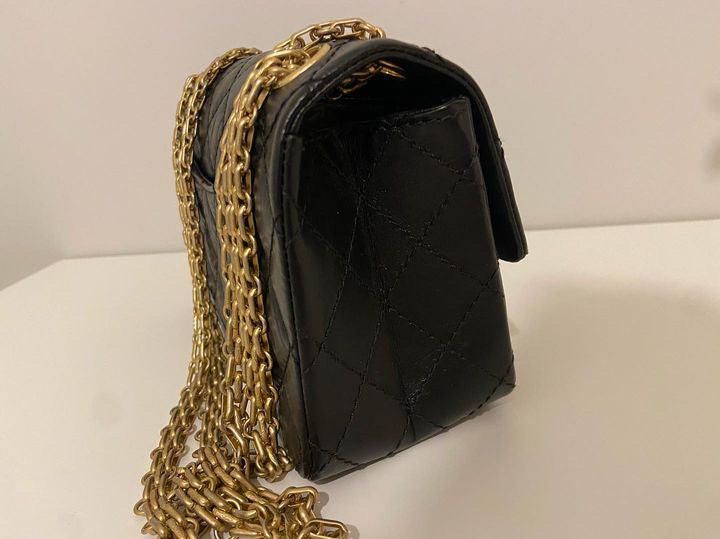 Chanel series 28 (2019) Black Calf skin Aged GHW Mini Reissue Flap Bag