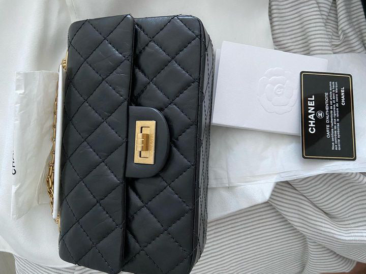 Chanel series 28 (2019) Black Calf skin Aged GHW Mini Reissue Flap Bag