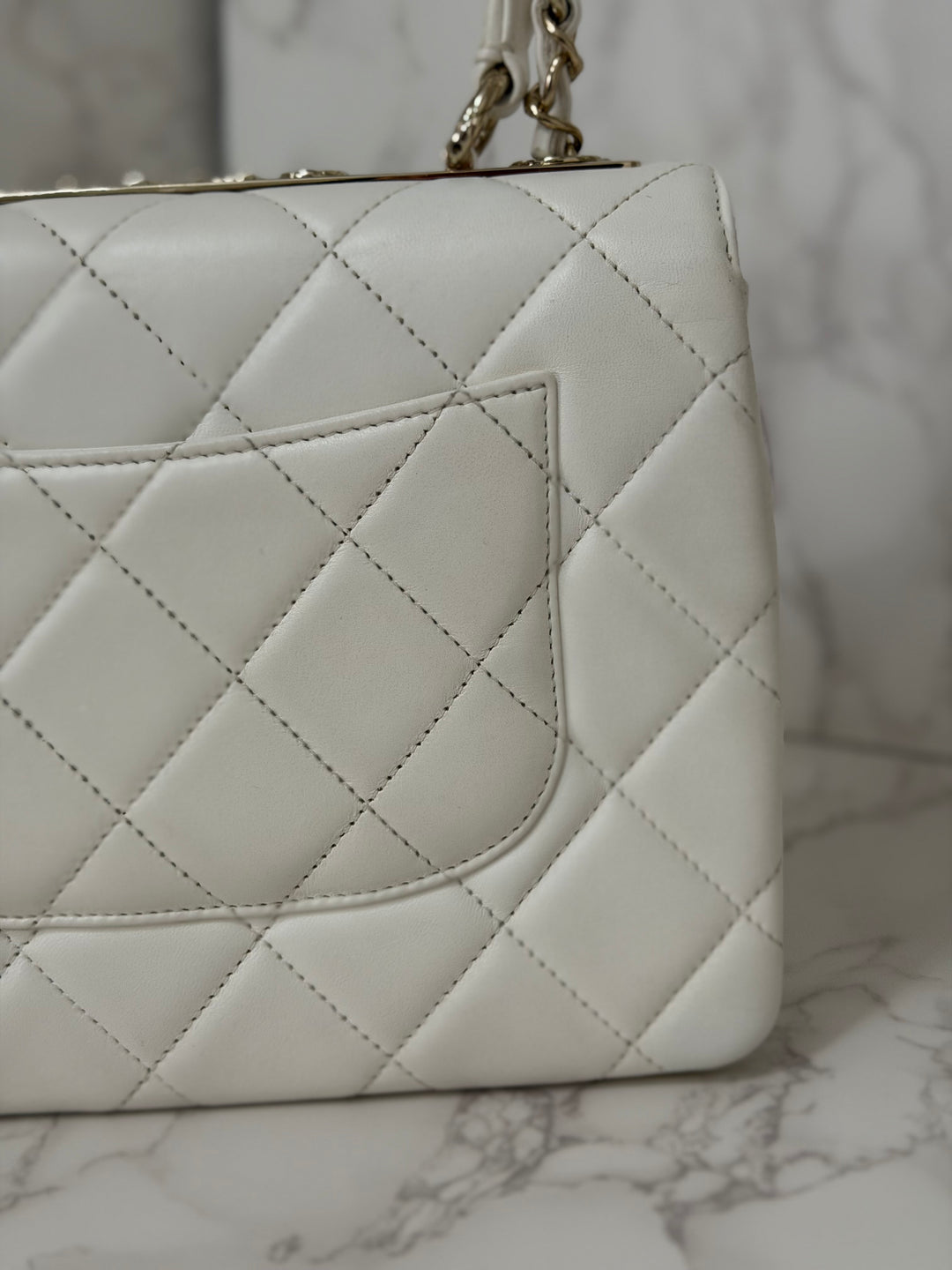 CHANEL 23S collection 2023 White Lambskin LGHW Trendy CC Flap Bag size Small with raised CHANEL Engraved Plate Top Handle