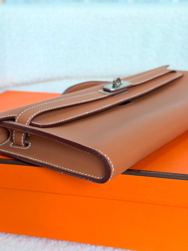 HERMÈS Kelly Cut Gold Swift Leather PHW 2014 Stamp R in []