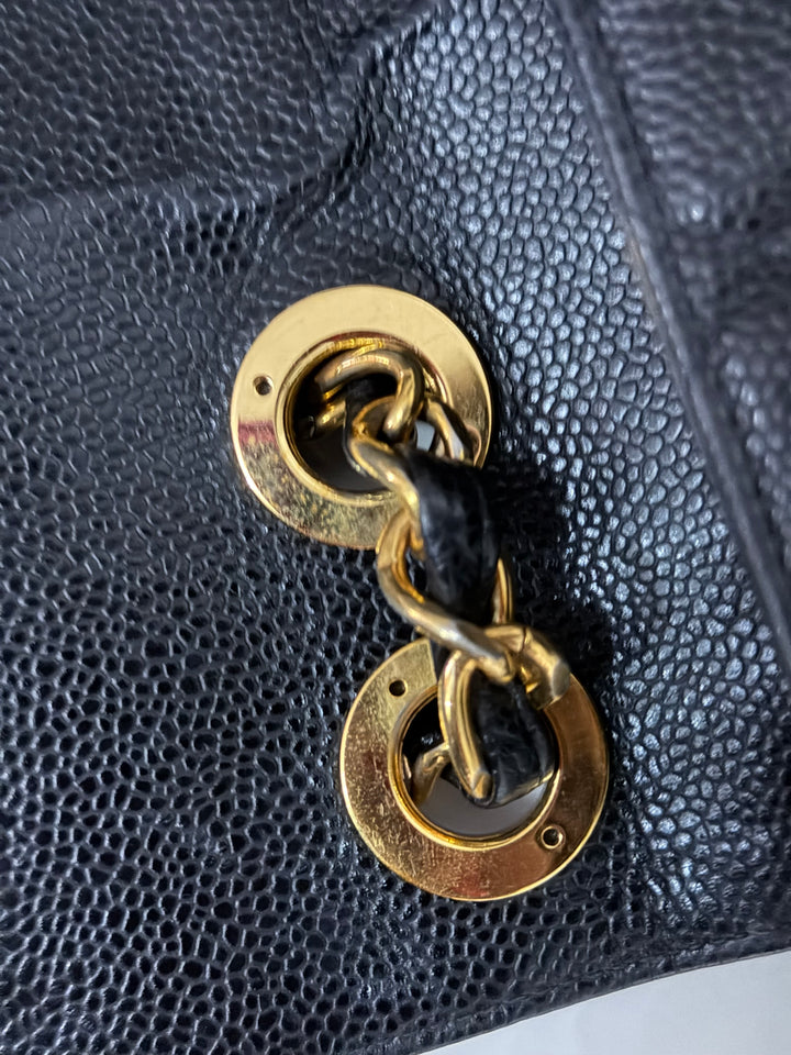Chanel Series 7 24K GHW Black Caviar Vintage Jumbo Single Flap Bag 2008/2009