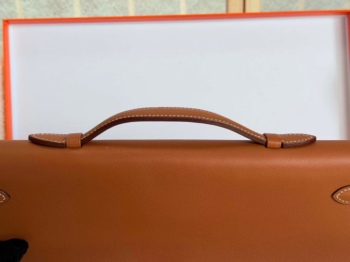 HERMÈS Kelly Cut Gold Swift Leather PHW 2014 Stamp R in []