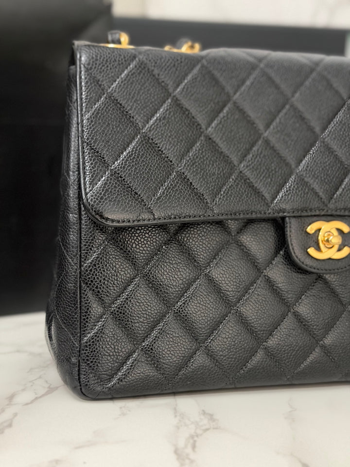 Chanel Series 7 24K GHW Black Caviar Vintage Jumbo Single Flap Bag 2008/2009