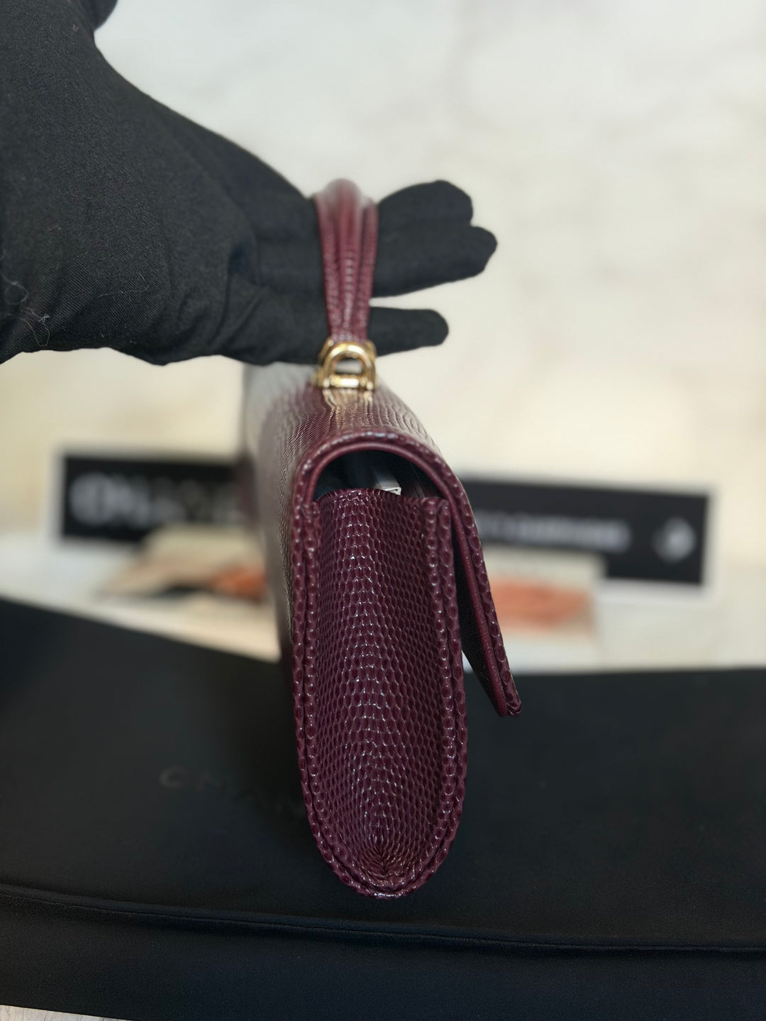 CHANEL 26A Matthieu Blazy Clutch with Top Handle in Burgundy Lizard-Embossed Calfskin with Light Gold Hardware 2026