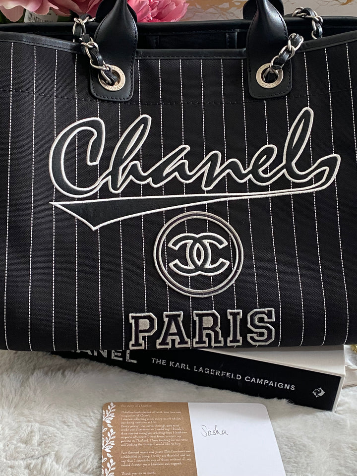 Chanel 23P 2023 collection in Black/White Stripe Canvas Deauville Tote with Top Handle and detachable pouch size Medium (15 inches)