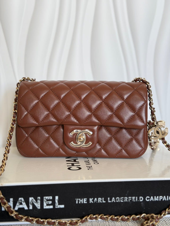 CHANEL 26S Brown Lambskin Adjustable Chain LGHW Mini Rectangular Flap Bag 2026