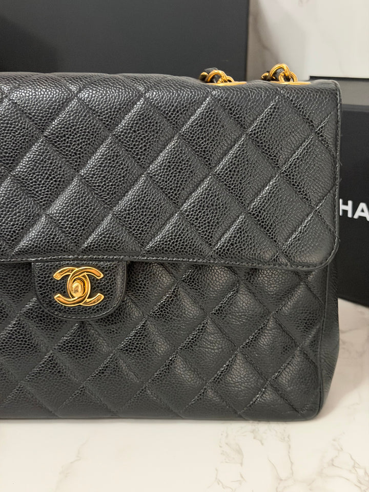 Chanel Series 7 24K GHW Black Caviar Vintage Jumbo Single Flap Bag 2008/2009