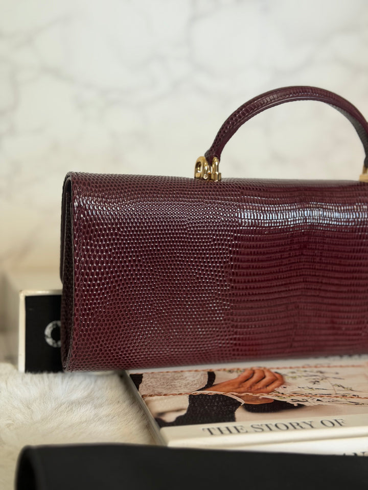 CHANEL 26A Matthieu Blazy Clutch with Top Handle in Burgundy Lizard-Embossed Calfskin with Light Gold Hardware 2026