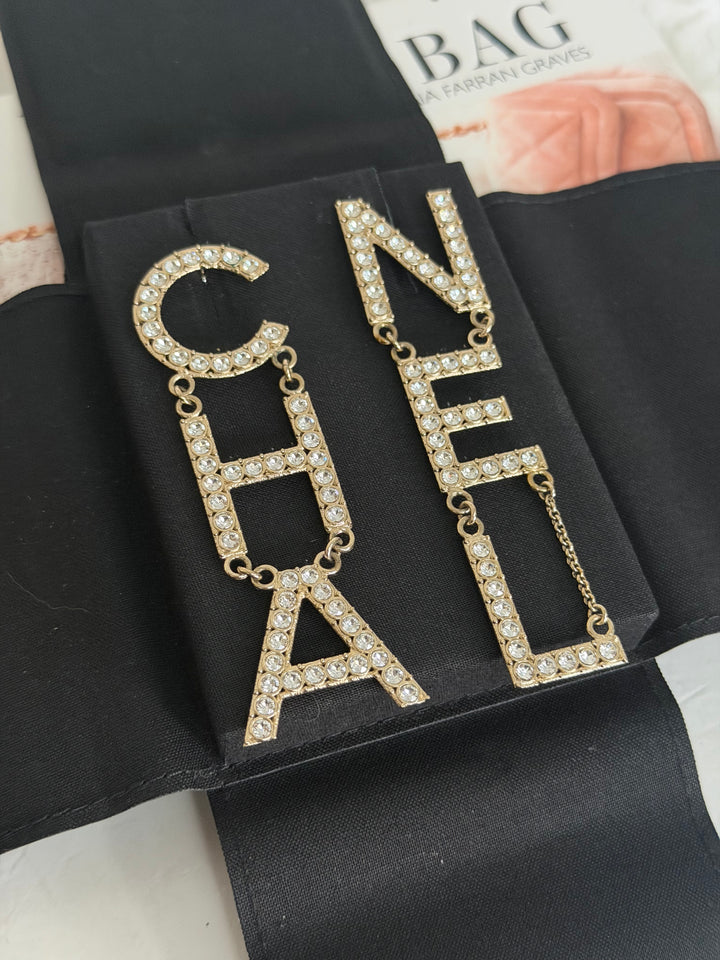 CHANEL Diamanté Letter Statement Earrings in Gold and Crystals