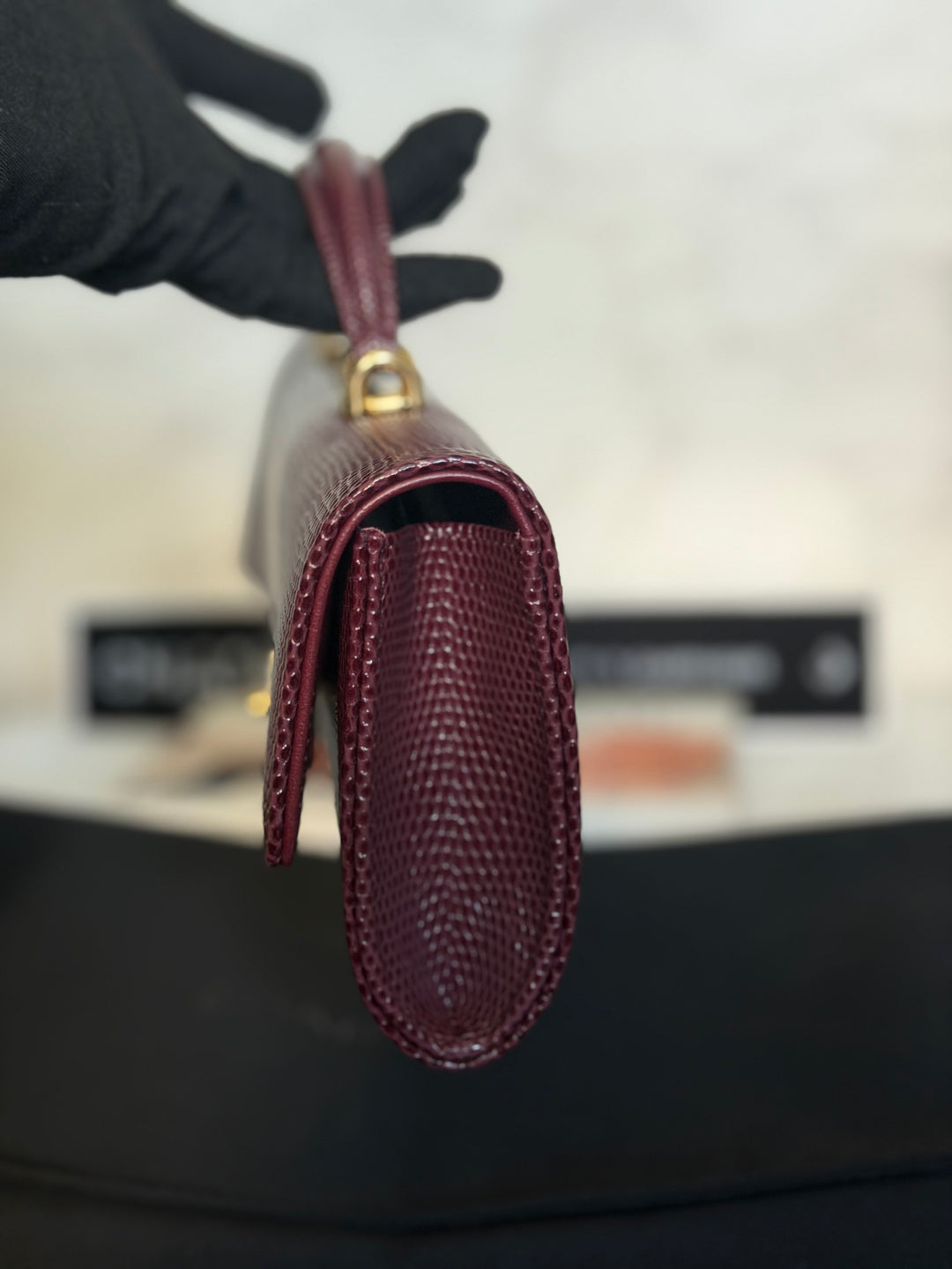 CHANEL 26A Matthieu Blazy Clutch with Top Handle in Burgundy Lizard-Embossed Calfskin with Light Gold Hardware 2026