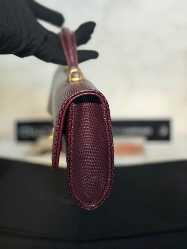 CHANEL 26A Matthieu Blazy Clutch with Top Handle in Burgundy Lizard-Embossed Calfskin with Light Gold Hardware 2026