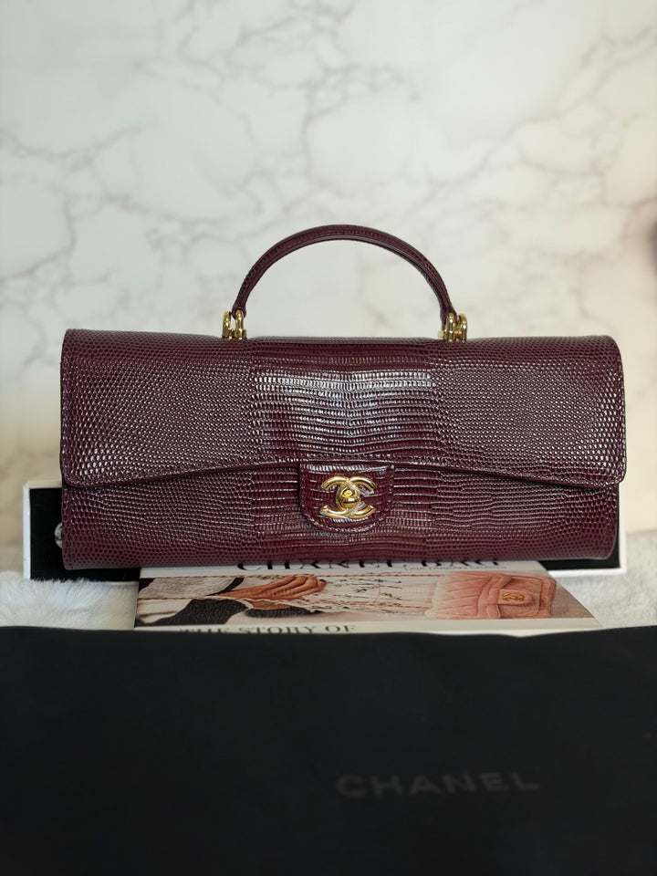 CHANEL 26A Matthieu Blazy Clutch with Top Handle in Burgundy Lizard-Embossed Calfskin with Light Gold Hardware 2026