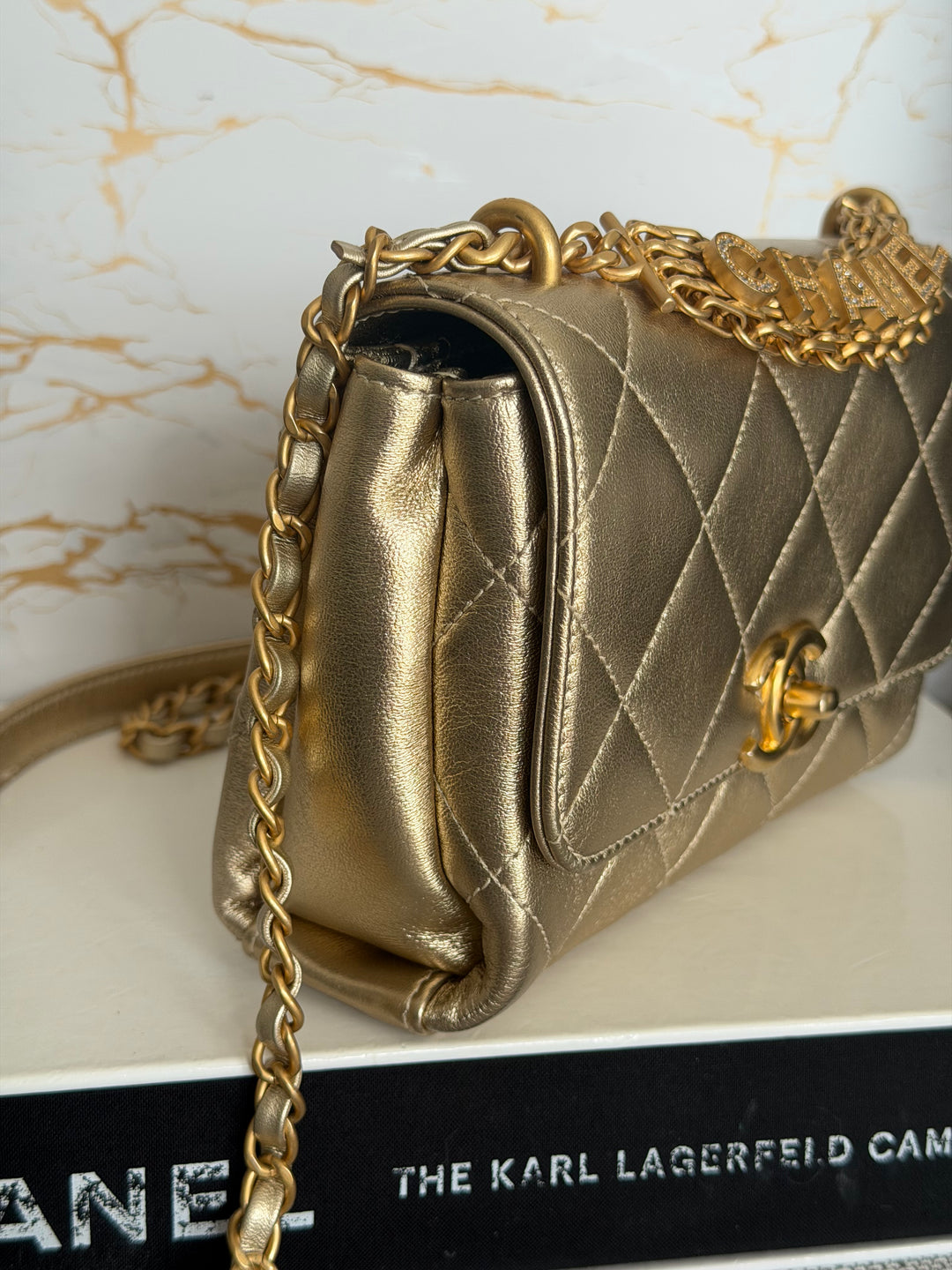 CHANEL Gold Metallic Lambskin CC Crystal Logo Chain Flap Bag 2022