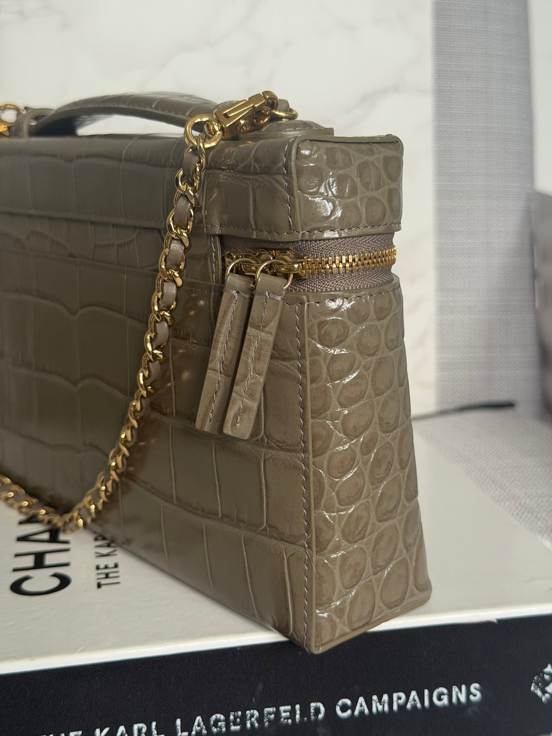 CHANEL 26A Etoupe Khaki Croc Embossed Calf skin LGHW LP Long Vanity size Medium 23 cms with detachable chain 2026