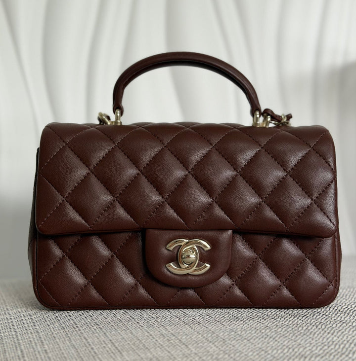 CHANEL 25K collection 2025 Brown Lambskin LGHW Mini Rectangular Flap Bag with Leather Top Handle
