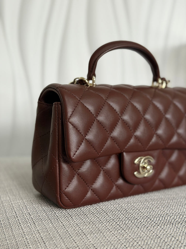 CHANEL 25K collection 2025 Brown Lambskin LGHW Mini Rectangular Flap Bag with Leather Top Handle