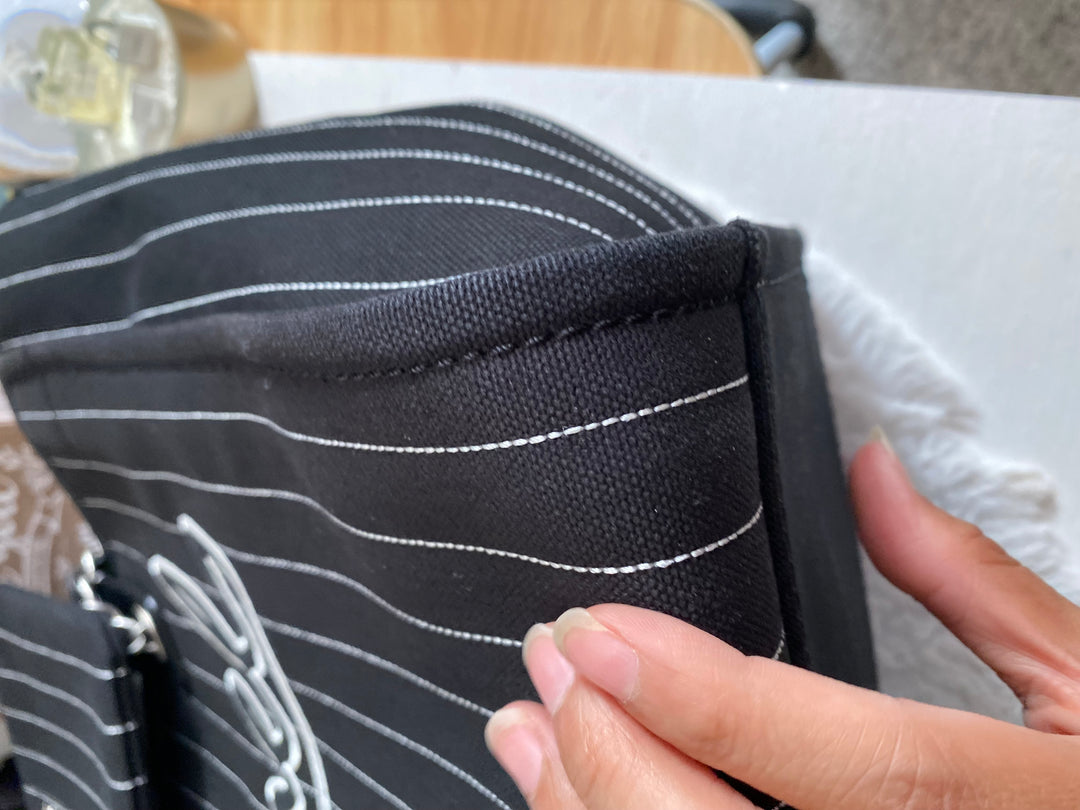 Chanel 23P 2023 collection in Black/White Stripe Canvas Deauville Tote with Top Handle and detachable pouch size Medium (15 inches)