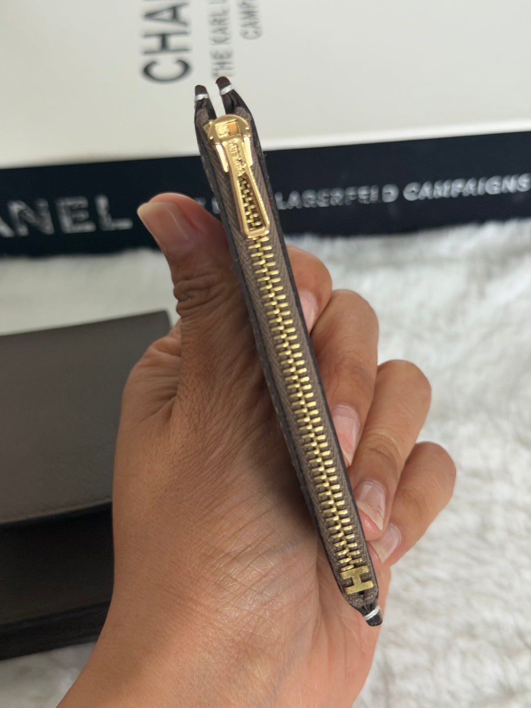HERMÈS Mini Roulis Slim Wallet in Ecorce outer and Etoupe inner Evercolor leather GHW