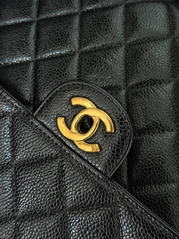 Chanel Series 7 24K GHW Black Caviar Vintage Jumbo Single Flap Bag 2008/2009