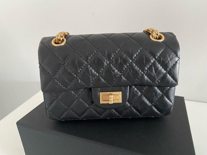 Chanel series 28 (2019) Black Calf skin Aged GHW Mini Reissue Flap Bag