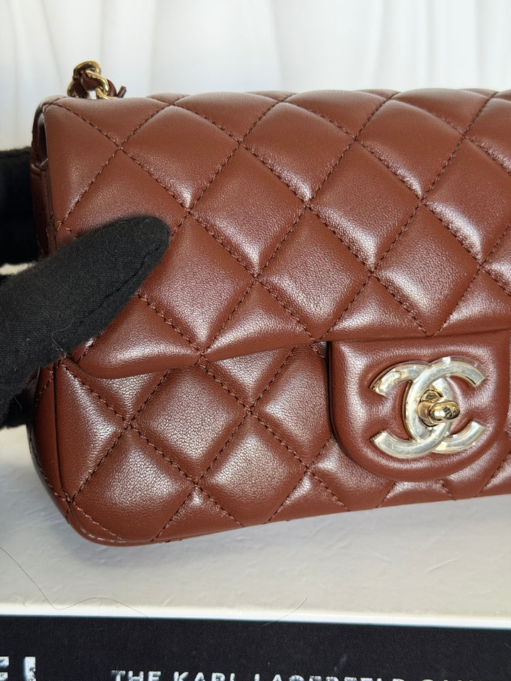 CHANEL 26S Brown Lambskin Adjustable Chain LGHW Mini Rectangular Flap Bag 2026