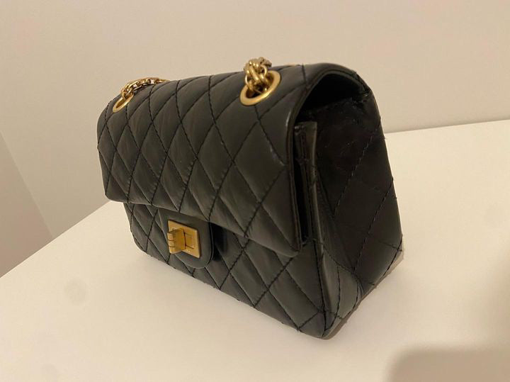 Chanel series 28 (2019) Black Calf skin Aged GHW Mini Reissue Flap Bag