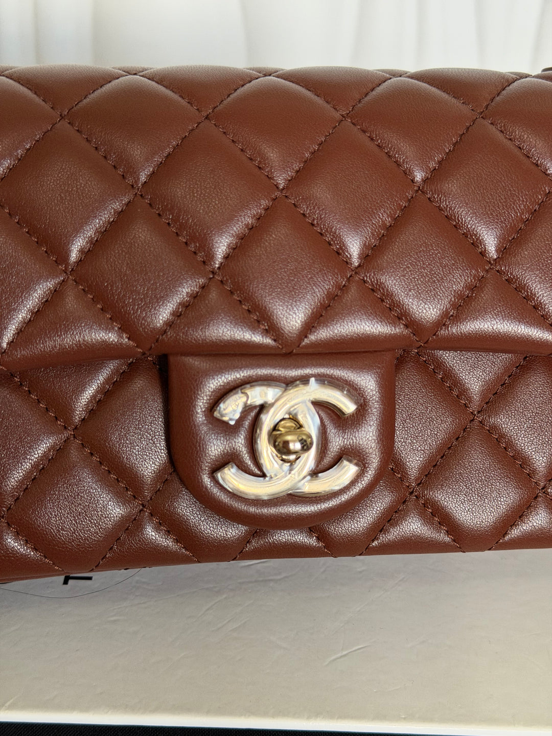 CHANEL 26S Brown Lambskin Adjustable Chain LGHW Mini Rectangular Flap Bag 2026