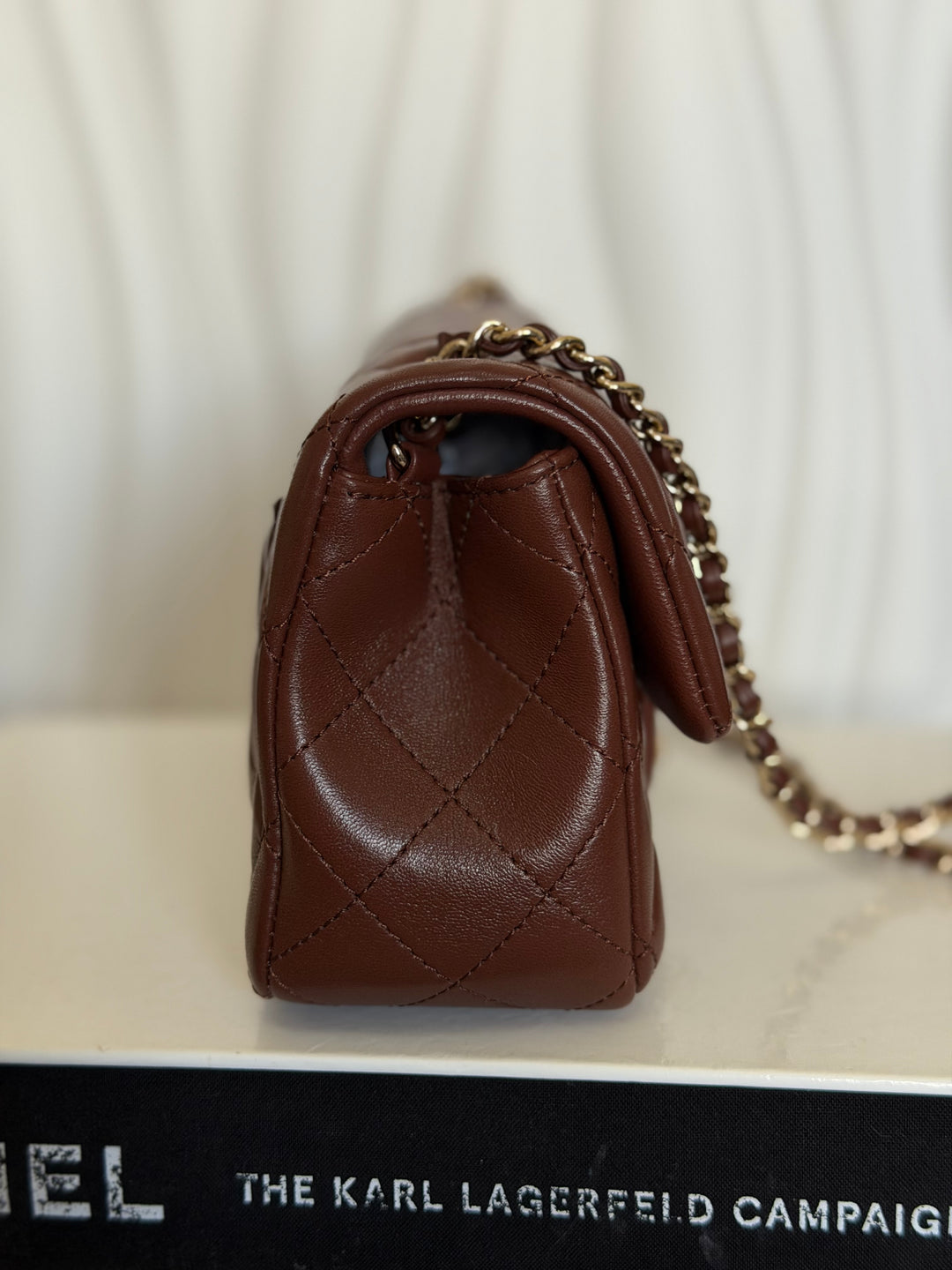 CHANEL 26S Brown Lambskin Adjustable Chain LGHW Mini Rectangular Flap Bag 2026