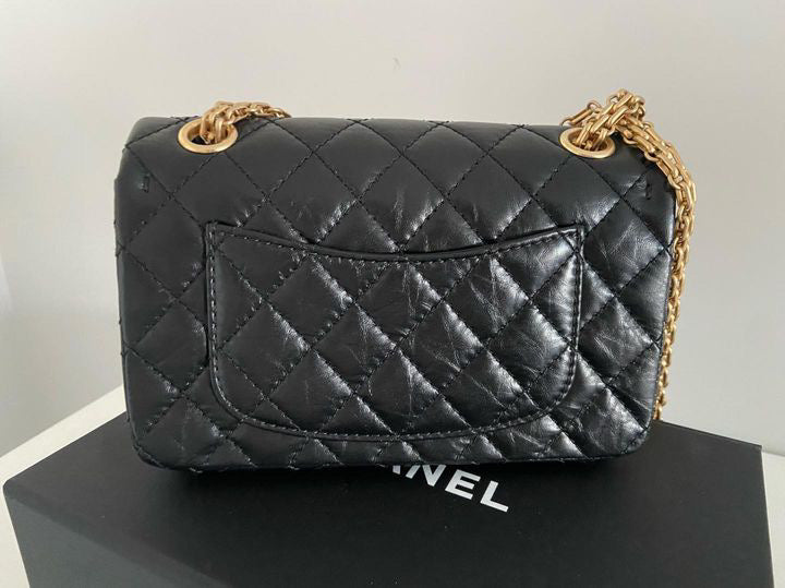 Chanel series 28 (2019) Black Calf skin Aged GHW Mini Reissue Flap Bag