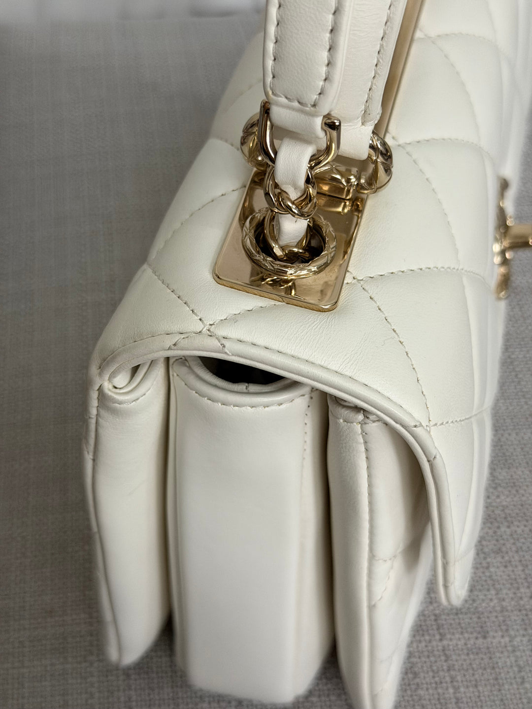 CHANEL 23S collection 2023 White Lambskin LGHW Trendy CC Flap Bag size Small with raised CHANEL Engraved Plate Top Handle
