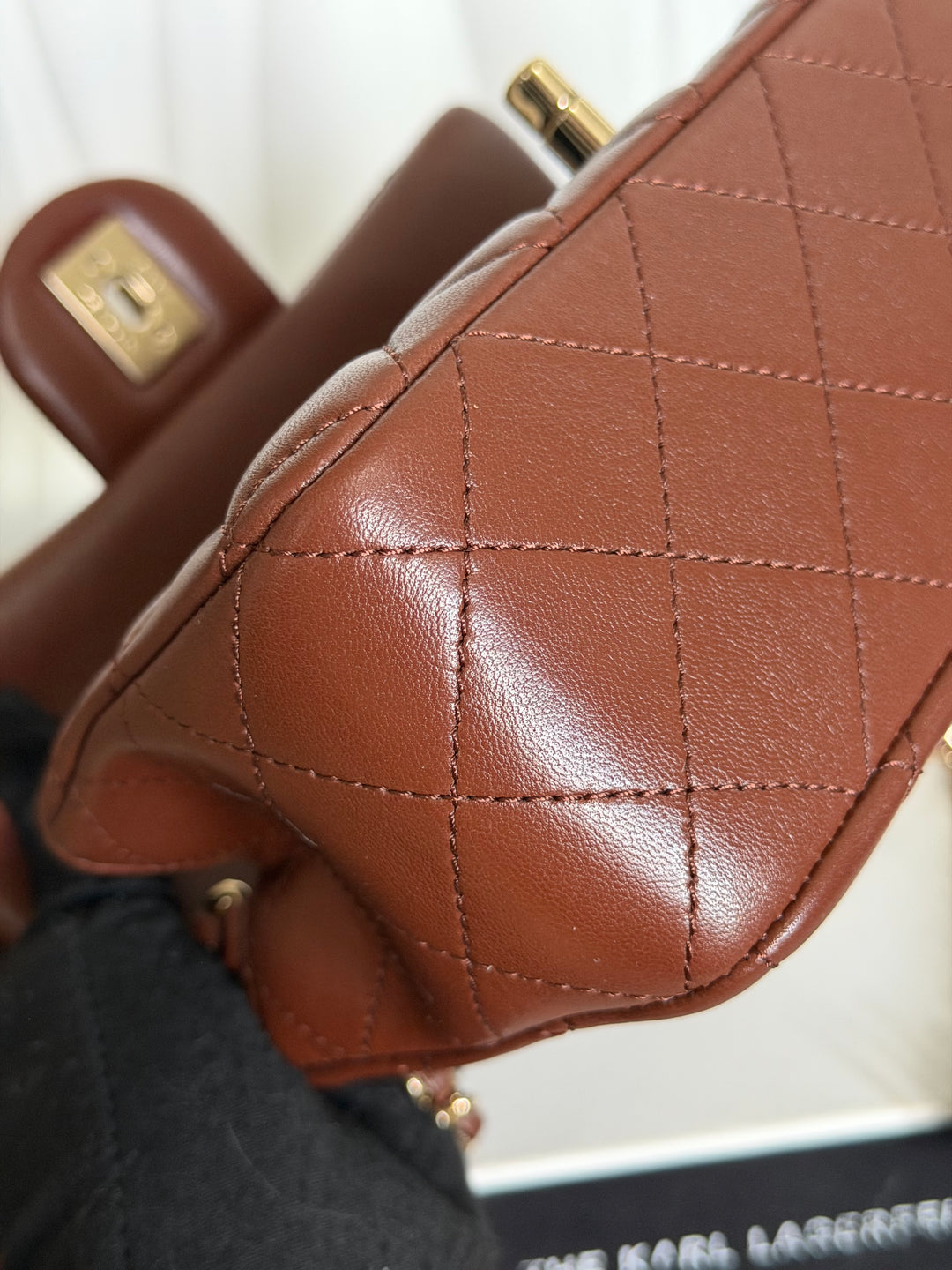 CHANEL 26S Brown Lambskin Adjustable Chain LGHW Mini Rectangular Flap Bag 2026