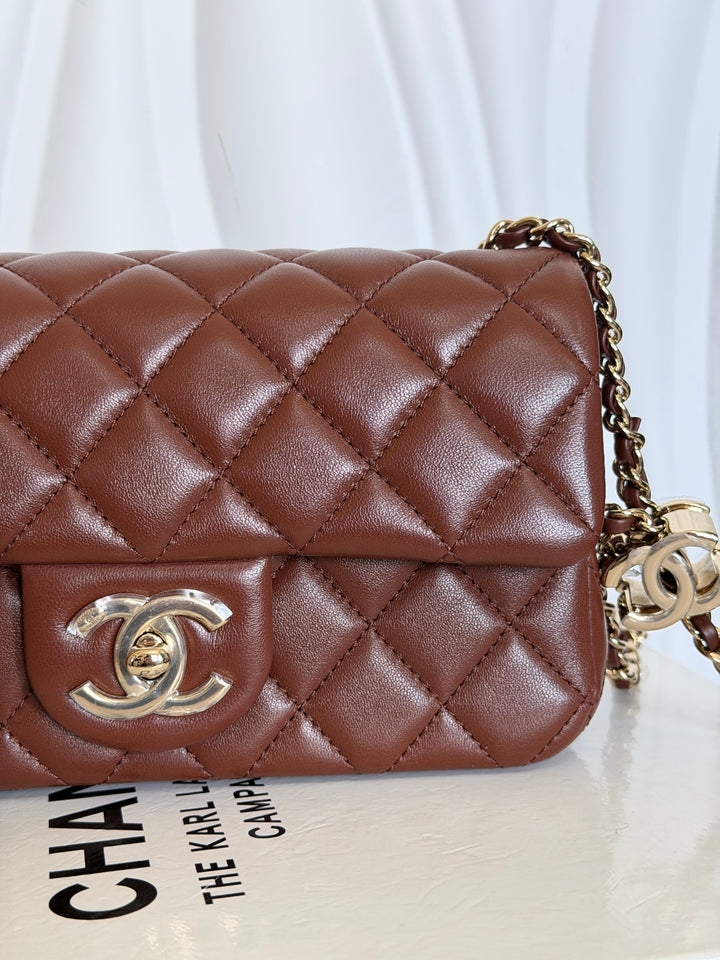 CHANEL 26S Brown Lambskin Adjustable Chain LGHW Mini Rectangular Flap Bag 2026