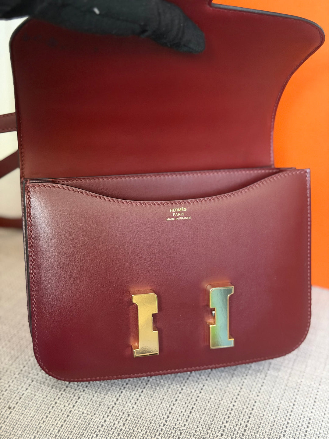 HERMÈS Rouge H Box Leather GHW Mini Constance 18 Flap Bag stamp D 2019