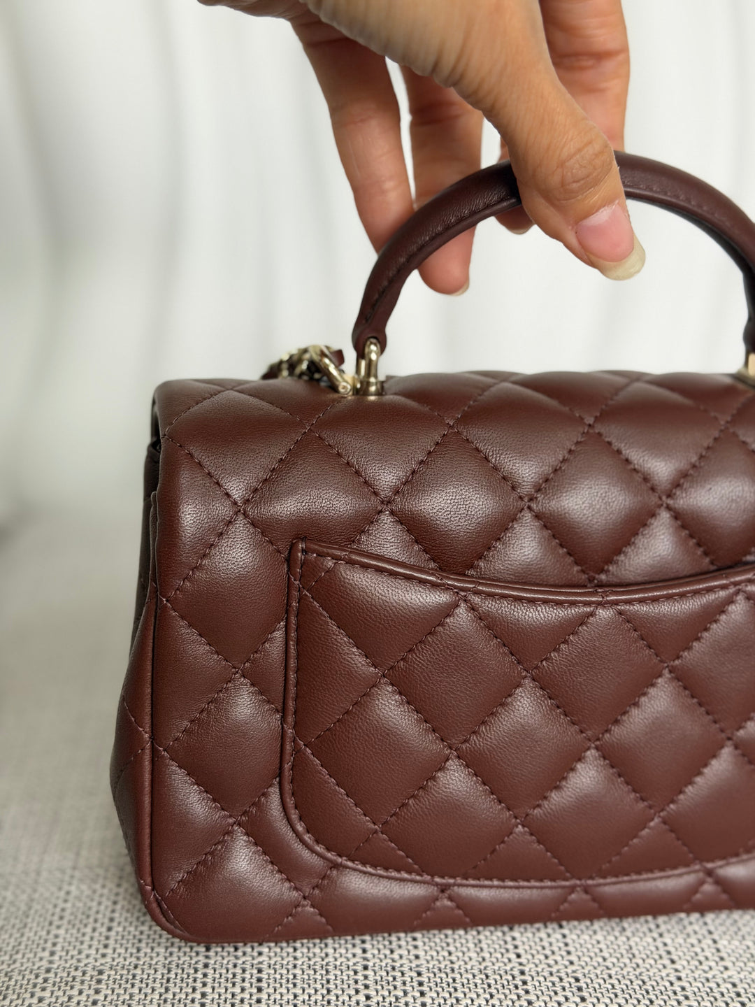 CHANEL 25K collection 2025 Brown Lambskin LGHW Mini Rectangular Flap Bag with Leather Top Handle