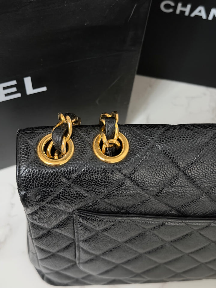 Chanel Series 7 24K GHW Black Caviar Vintage Jumbo Single Flap Bag 2008/2009