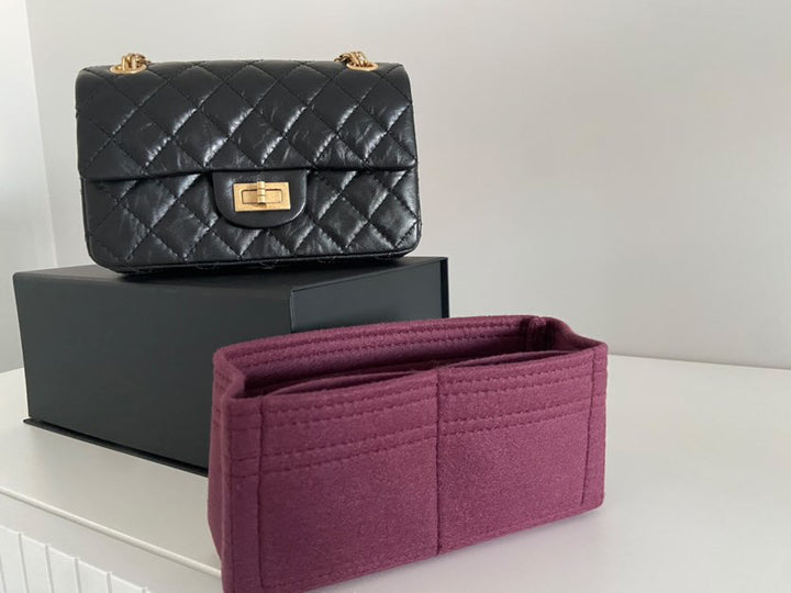 Chanel series 28 (2019) Black Calf skin Aged GHW Mini Reissue Flap Bag